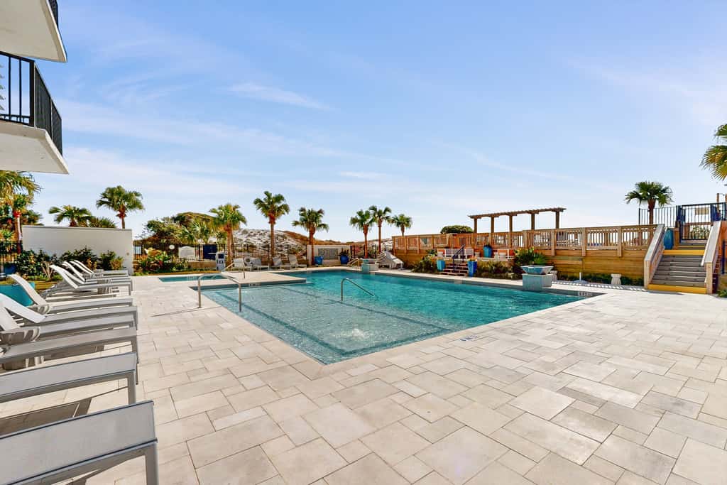 Gulf-front condo with balcony, ocean view, W&D, pool, hot tub & tennis