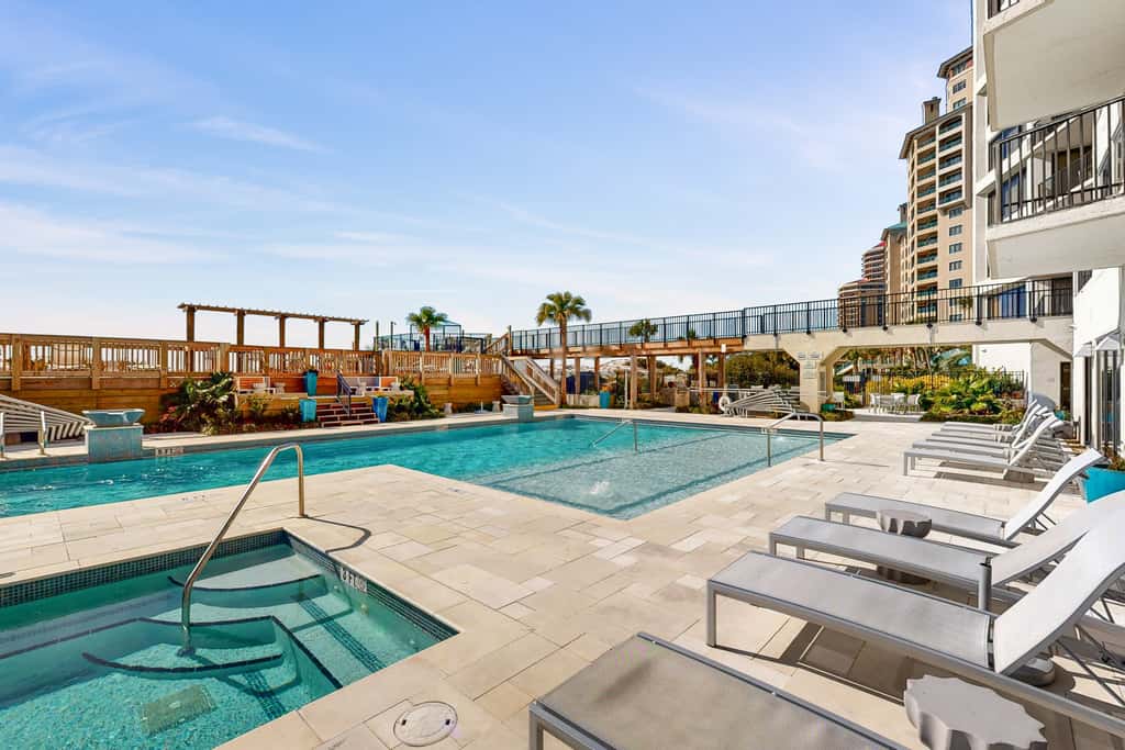 Gulf-front condo with balcony, ocean view, W&D, pool, hot tub & tennis