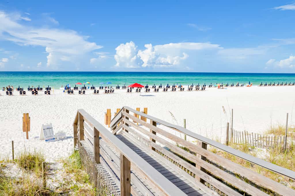 Gulf-front condo with balcony, ocean view, W&D, pool, hot tub & tennis