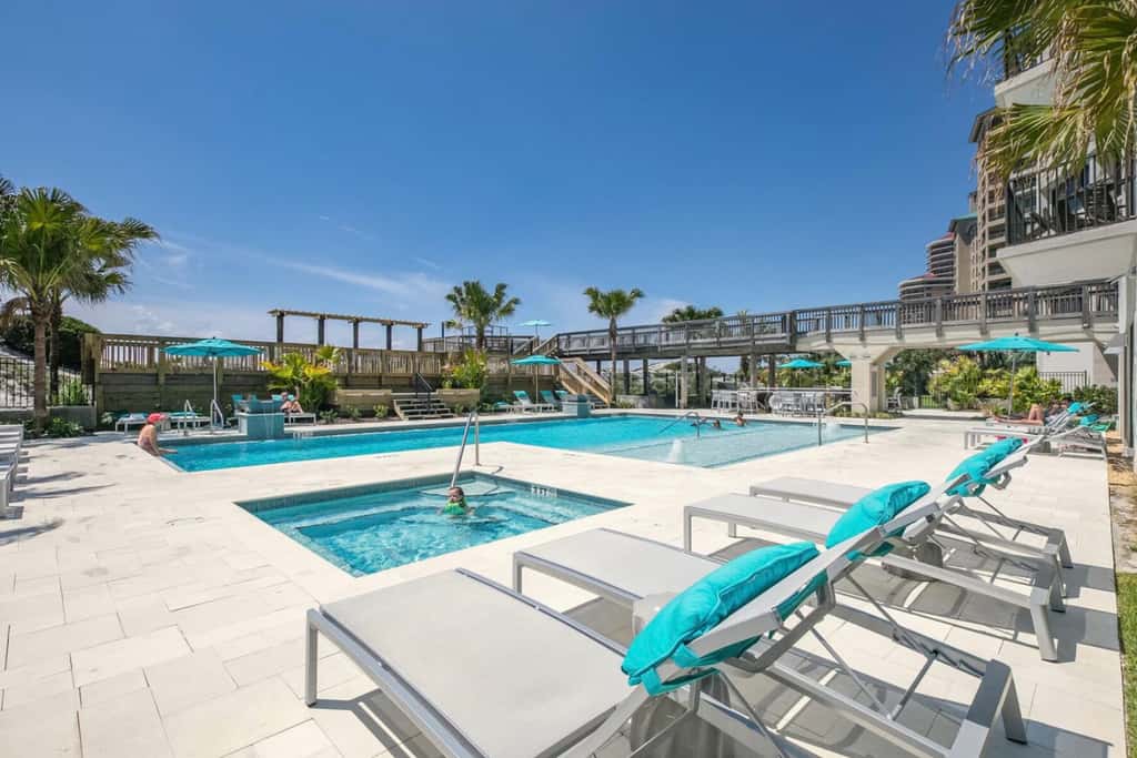 Gulf-front condo with balcony, ocean view, W&D, pool, hot tub & tennis