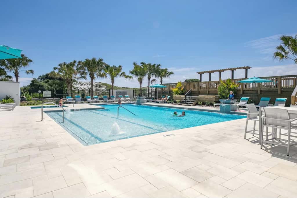 Gulf-front condo with balcony, ocean view, W&D, pool, hot tub & tennis