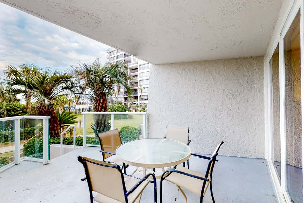 Beautiful beachfront condo with pool, beach tram, tennis, golf, & on-site dining