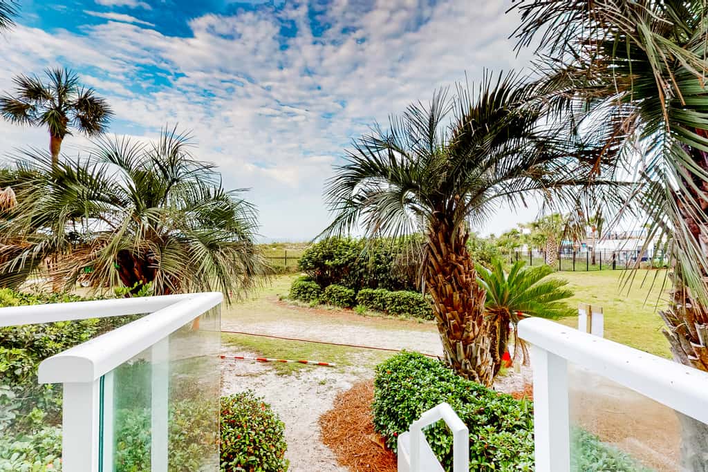 Beautiful beachfront condo with pool, beach tram, tennis, golf, & on-site dining