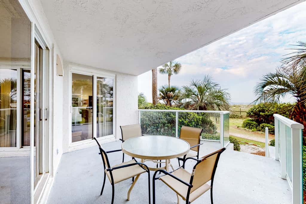 Beautiful beachfront condo with pool, beach tram, tennis, golf, & on-site dining