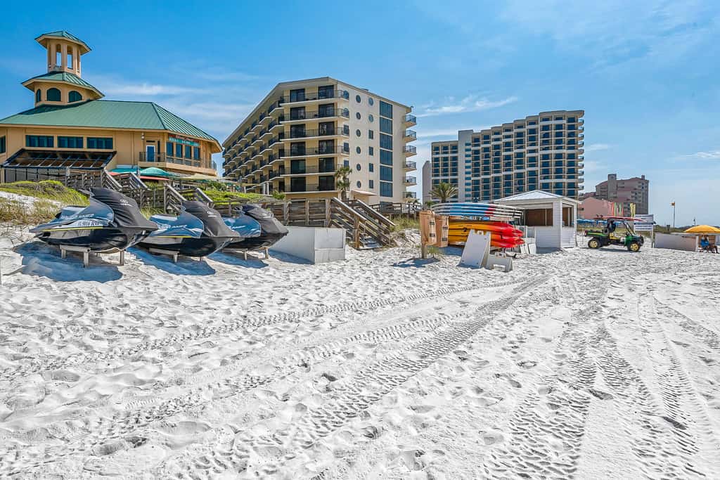 Beautiful beachfront condo with pool, beach tram, tennis, golf, & on-site dining