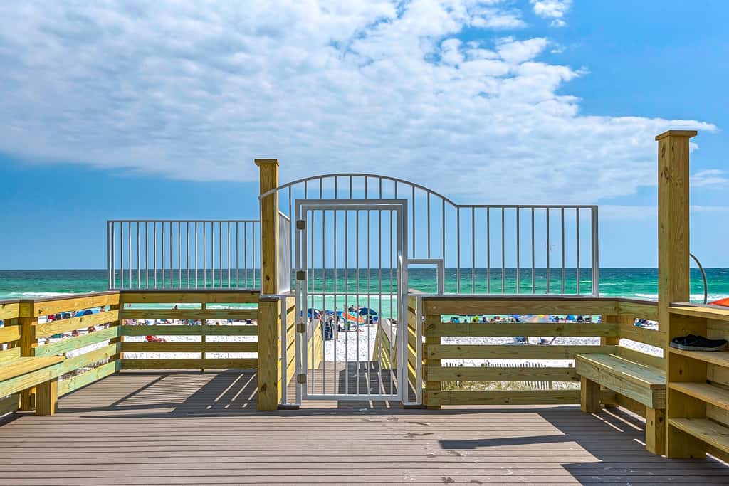 Beautiful beachfront condo with pool, beach tram, tennis, golf, & on-site dining