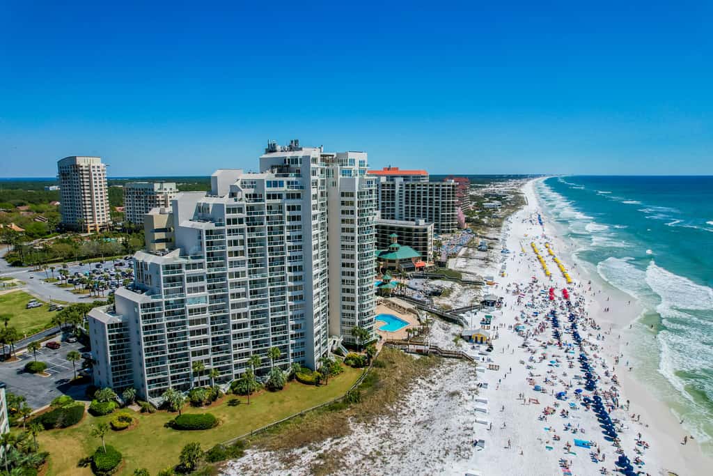 Beautiful beachfront condo with pool, beach tram, tennis, golf, & on-site dining