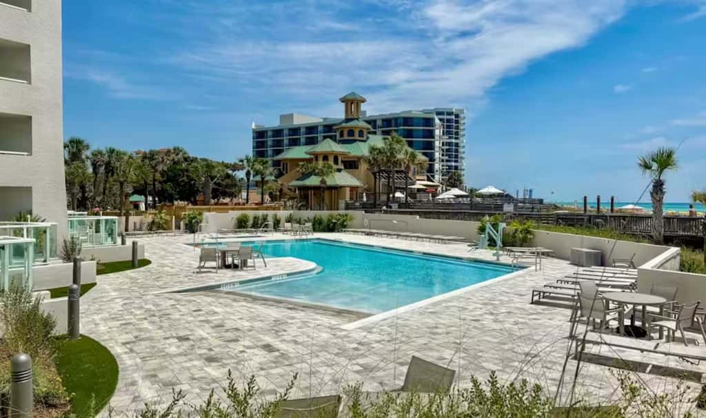 Beautiful beachfront condo with pool, beach tram, tennis, golf, & on-site dining