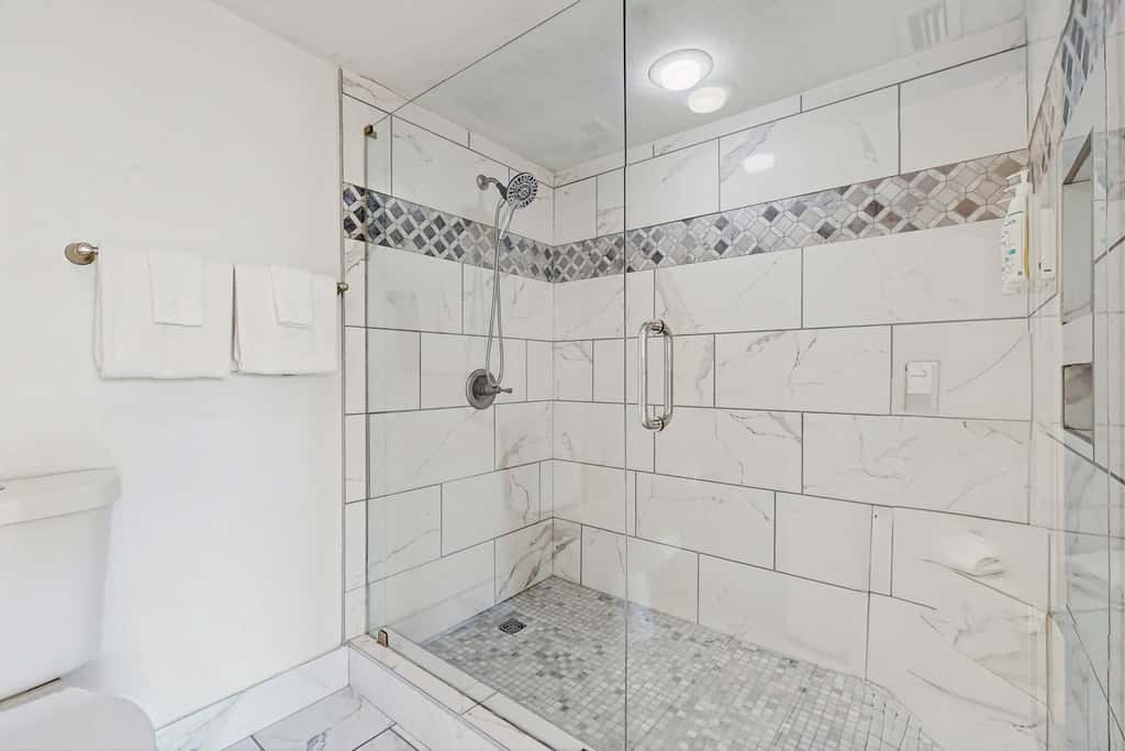 Beautiful beachfront condo with pool, beach tram, tennis, golf, & on-site dining