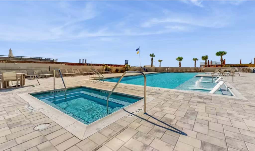 Beautiful beachfront condo with pool, beach tram, tennis, golf, & on-site dining
