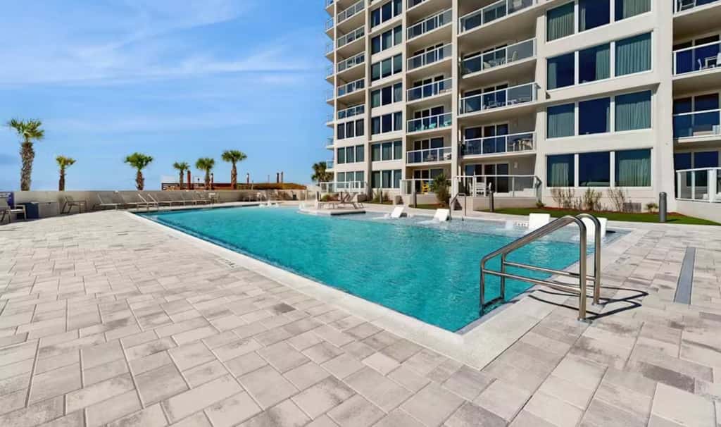 Beautiful beachfront condo with pool, beach tram, tennis, golf, & on-site dining