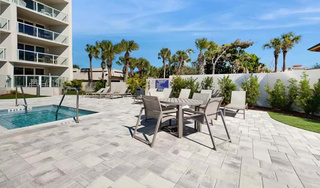 Beautiful beachfront condo with pool, beach tram, tennis, golf, & on-site dining
