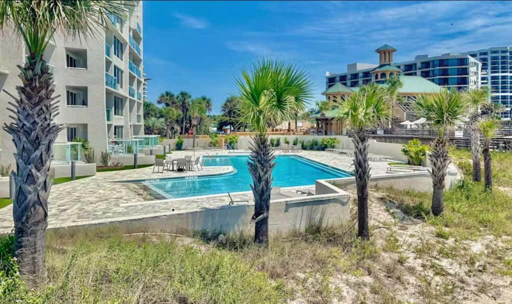 Beautiful beachfront condo with pool, beach tram, tennis, golf, & on-site dining