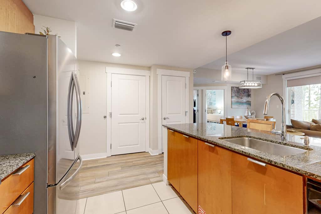 Spacious condo with bay views, renovated pool, hot tub, & beach access!