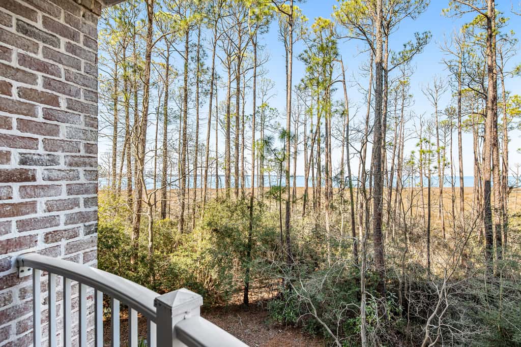 Spacious condo with bay views, renovated pool, hot tub, & beach access!