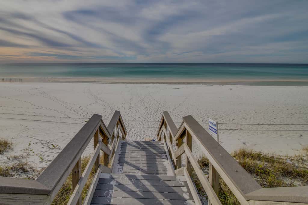 Spacious condo with bay views, renovated pool, hot tub, & beach access!