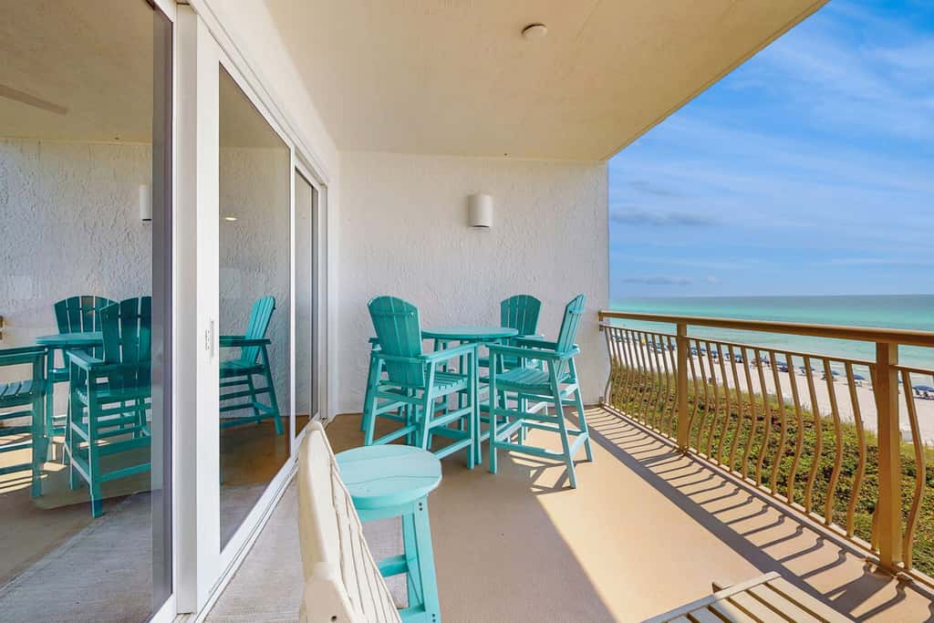 Open-concept beachfront home with balcony, lagoon pool, beach access, pickleball