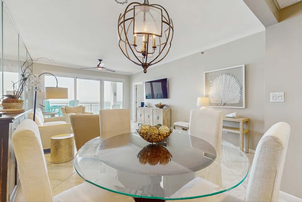 Open-concept beachfront home with balcony, lagoon pool, beach access, pickleball