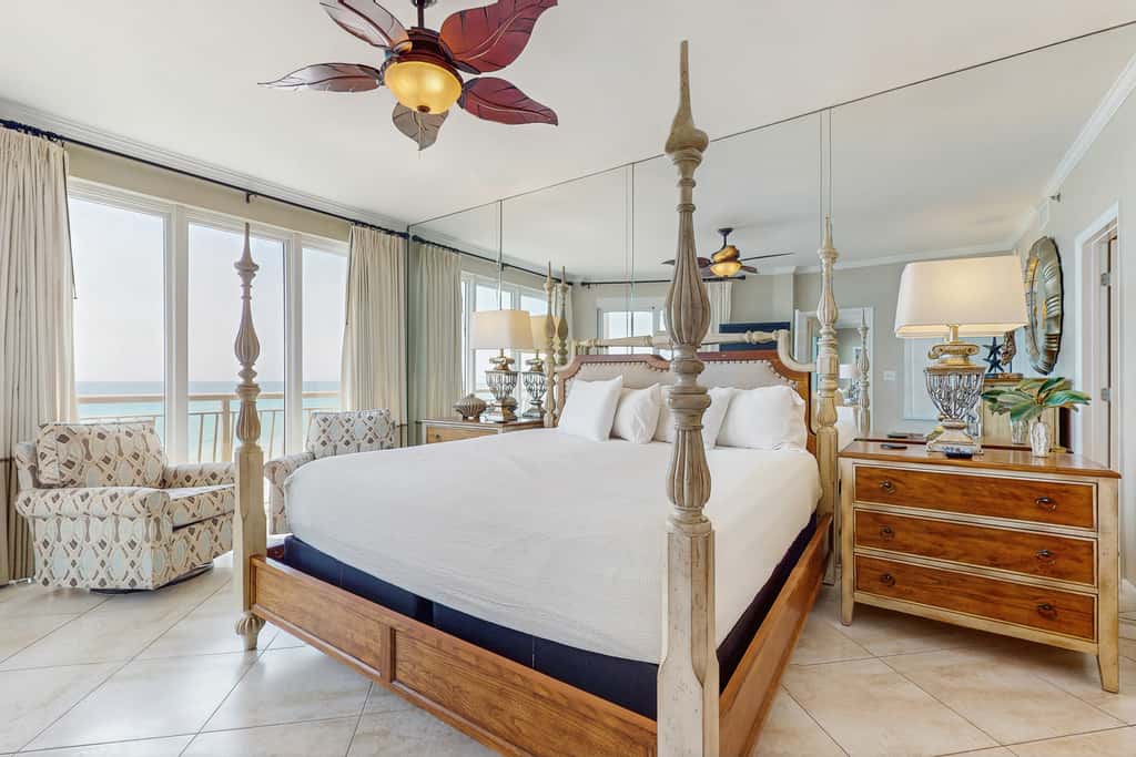 Open-concept beachfront home with balcony, lagoon pool, beach access, pickleball