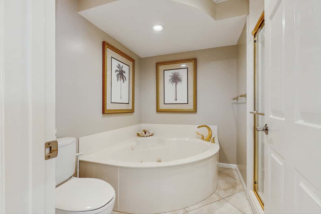 Open-concept beachfront home with balcony, lagoon pool, beach access, pickleball