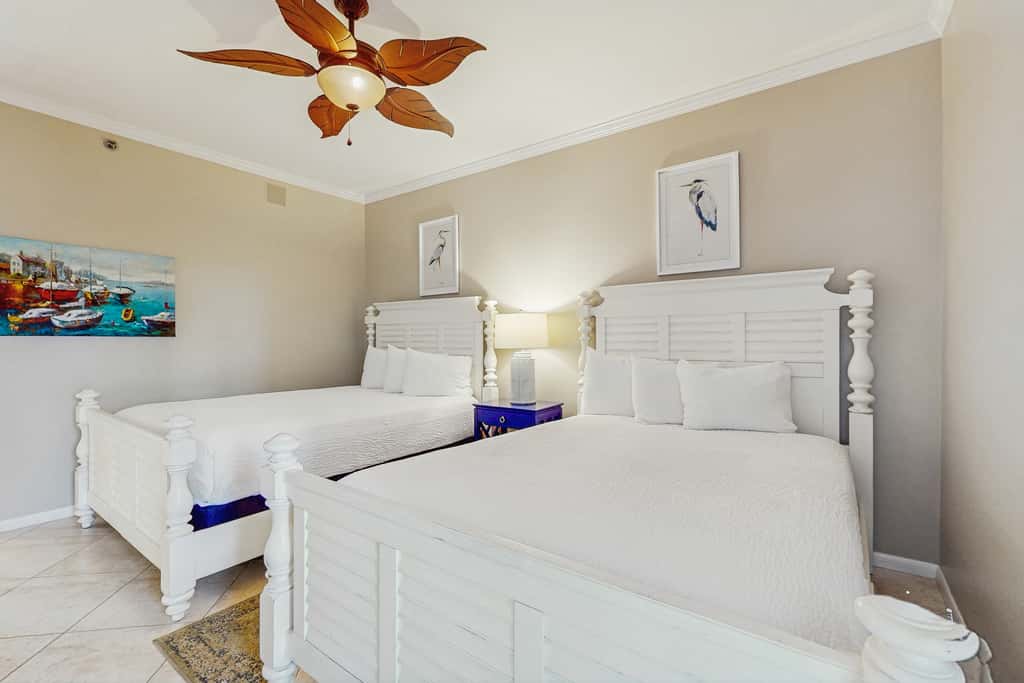 Open-concept beachfront home with balcony, lagoon pool, beach access, pickleball