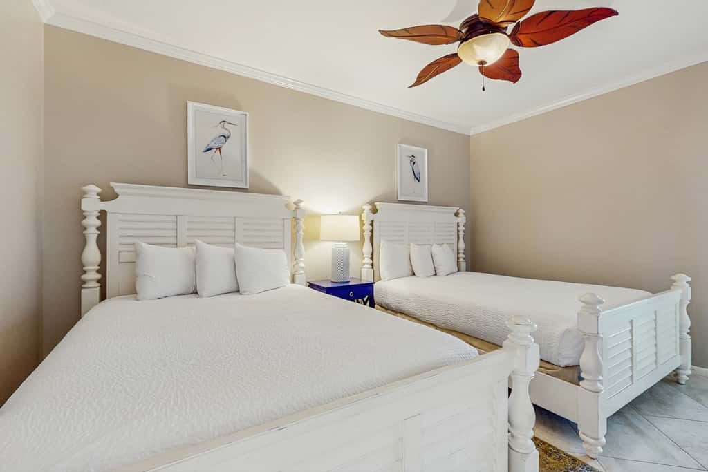 Open-concept beachfront home with balcony, lagoon pool, beach access, pickleball