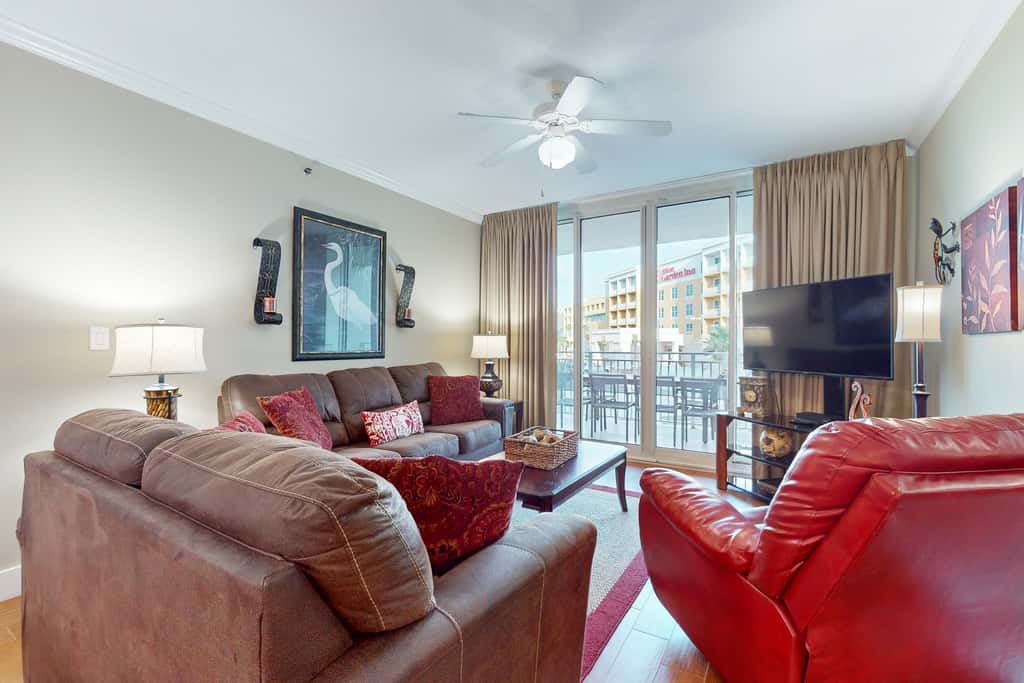 2nd-floor condo with balcony at Waterscape Waterfall, lazy river & beach chairs