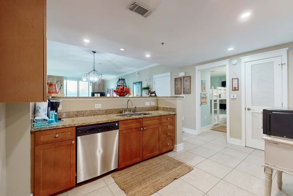 2nd-floor condo with balcony at Waterscape Waterfall, lazy river & beach chairs