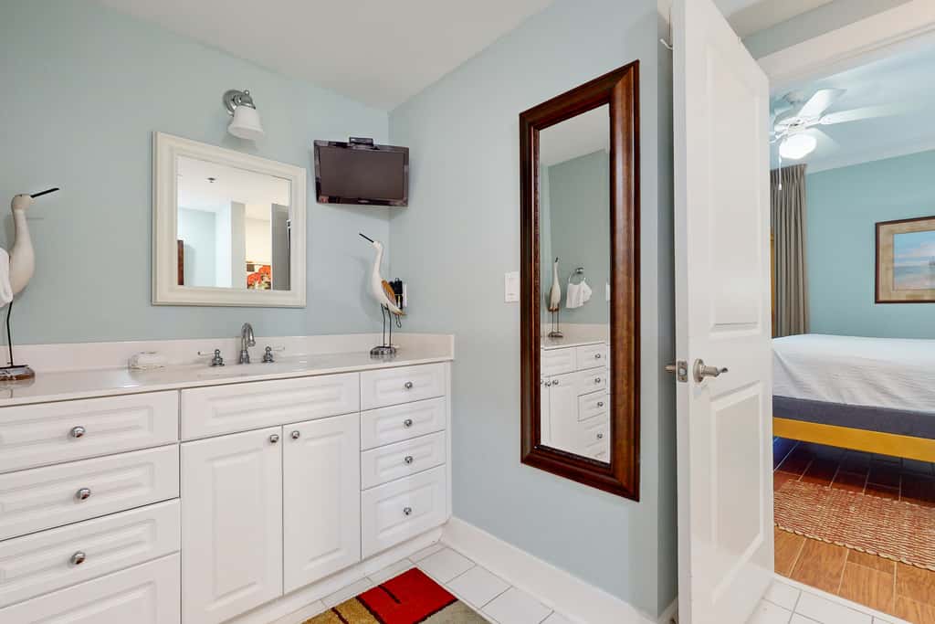 2nd-floor condo with balcony at Waterscape Waterfall, lazy river & beach chairs