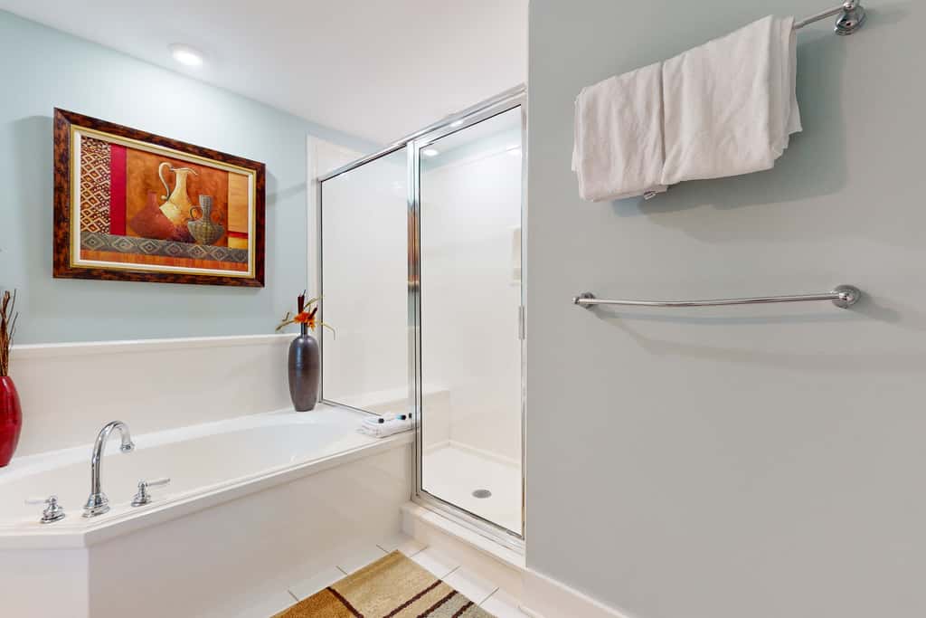 2nd-floor condo with balcony at Waterscape Waterfall, lazy river & beach chairs