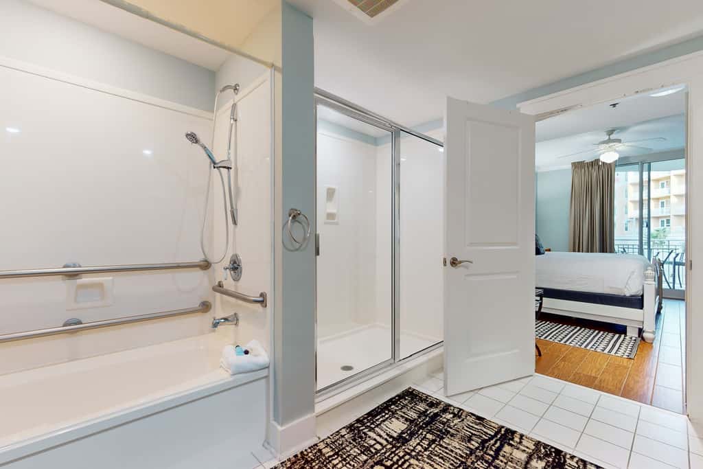 2nd-floor condo with balcony at Waterscape Waterfall, lazy river & beach chairs