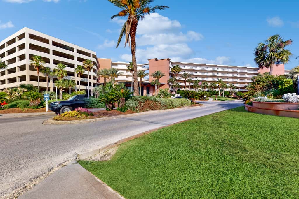 2nd-floor condo with balcony at Waterscape Waterfall, lazy river & beach chairs