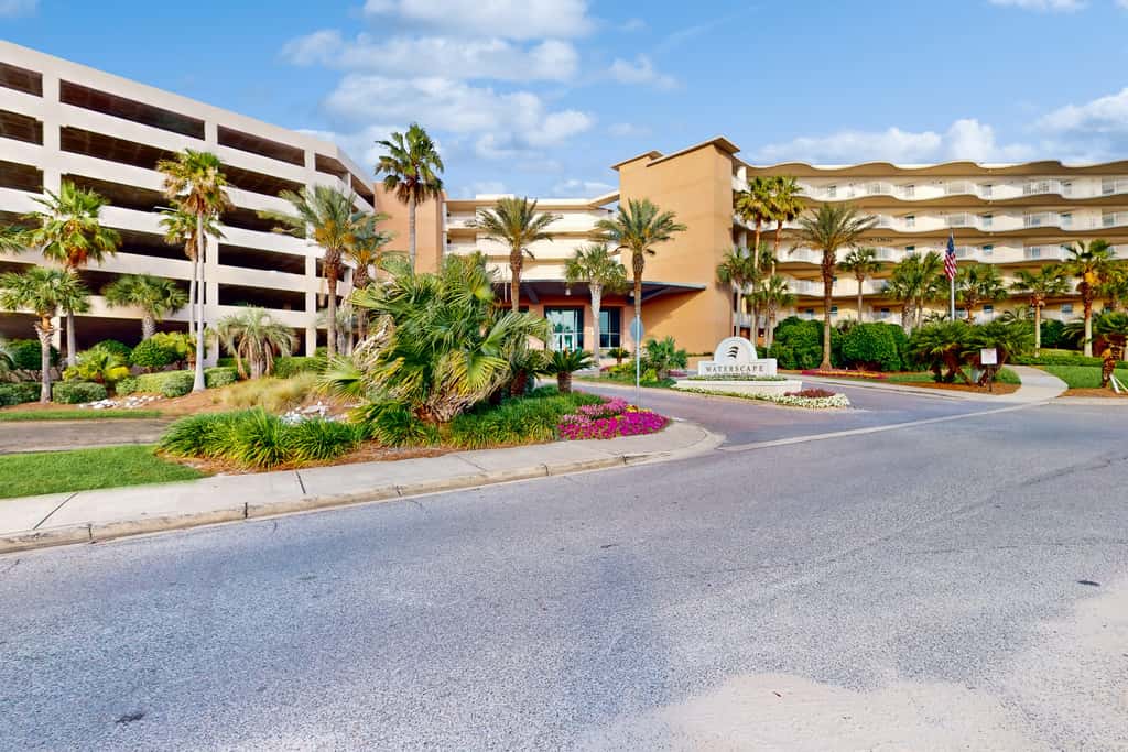 2nd-floor condo with balcony at Waterscape Waterfall, lazy river & beach chairs
