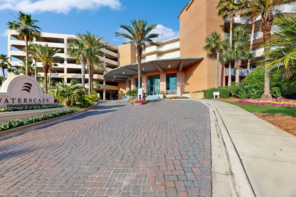 2nd-floor condo with balcony at Waterscape Waterfall, lazy river & beach chairs