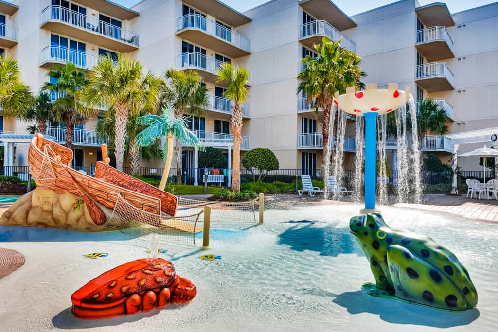 Cute, coastal condo with lazy river, Gulf view, hot tub & gym - near the beach