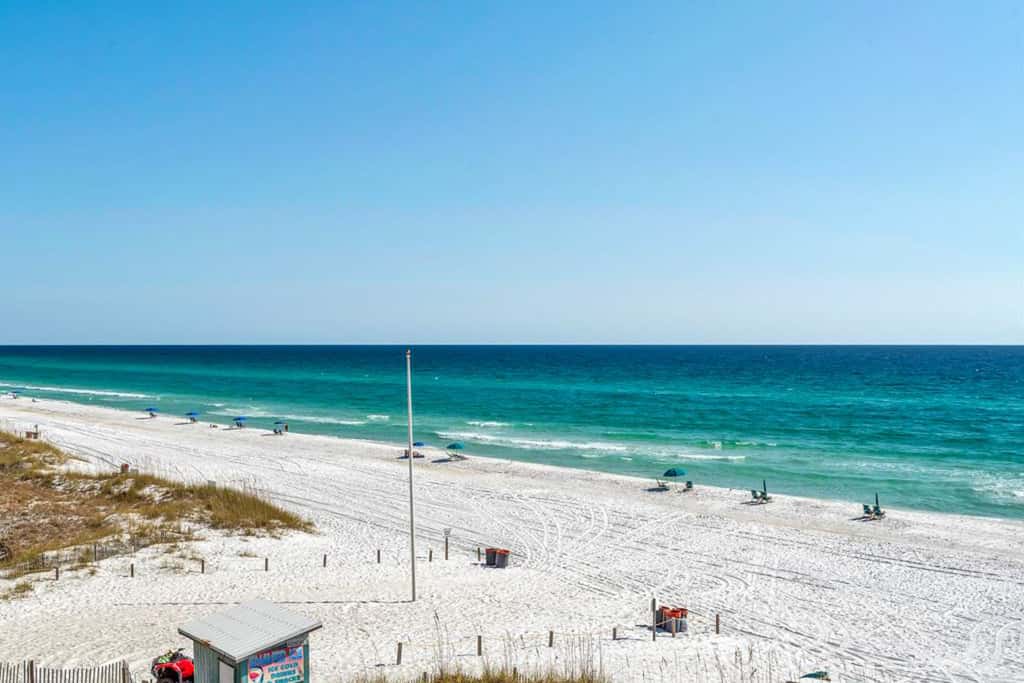 Oceanfront condo with AC, WiFi, pool & seasonal beach service