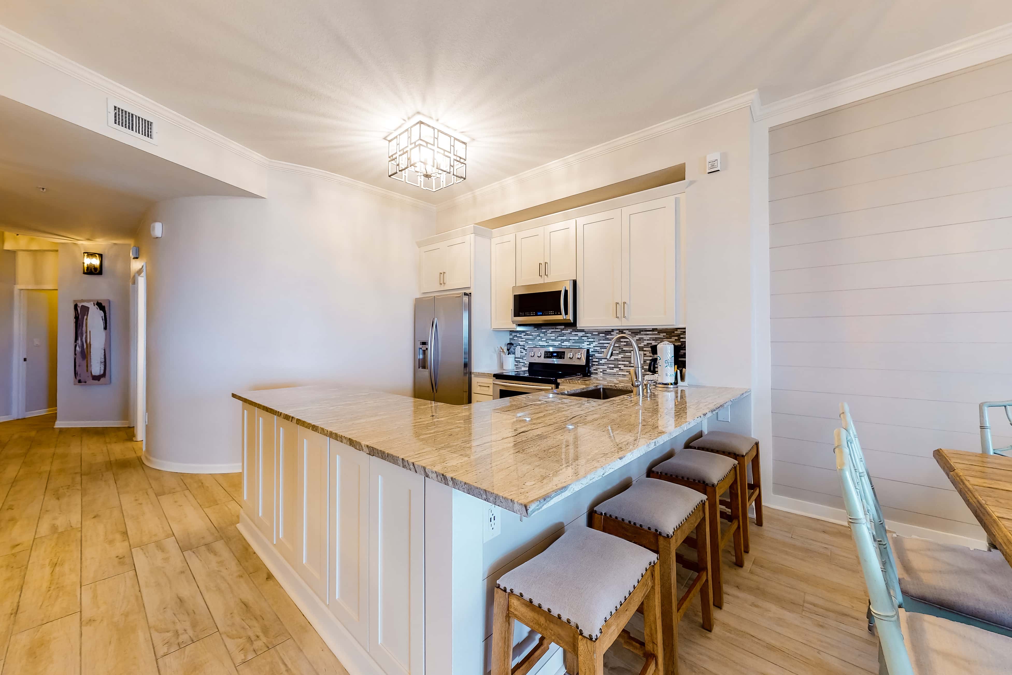 Stunning 4th-floor condo with pool, tennis, pickleball, ocean & beach view
