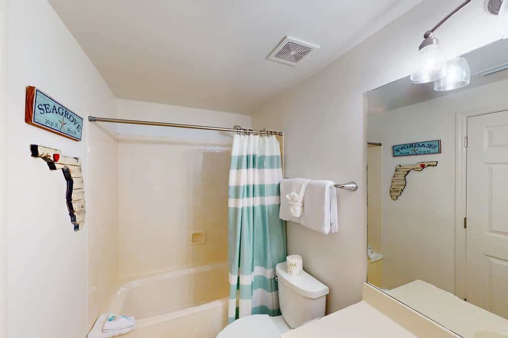 Coastal condo with beach, pool, hot tub, sauna, tennis, bikes, W&D, & central AC