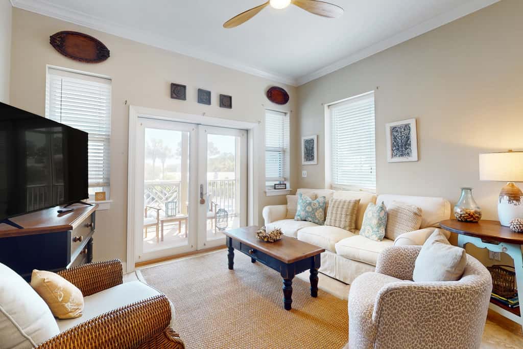 Stylish condo with screened balcony, pool, & tennis - near beach