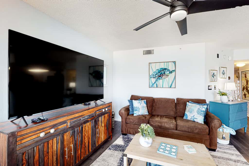 Beachfront condo with gulf views, pool, gym, & private balcony
