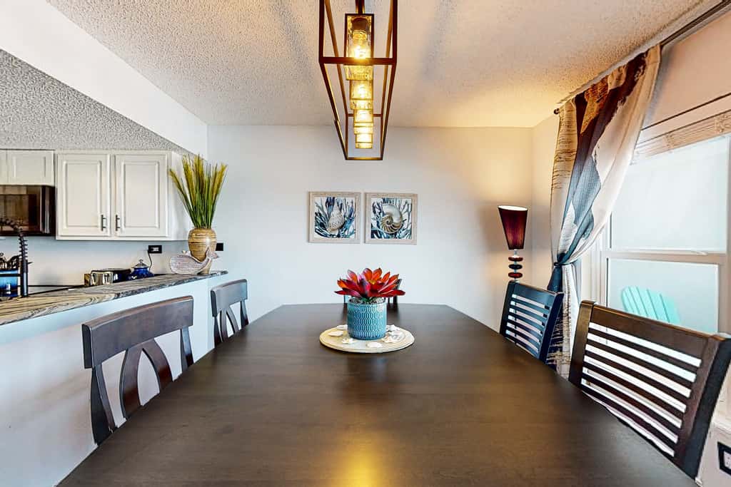 Beachfront condo with gulf views, pool, gym, & private balcony