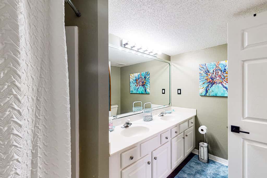 Beachfront condo with gulf views, pool, gym, & private balcony