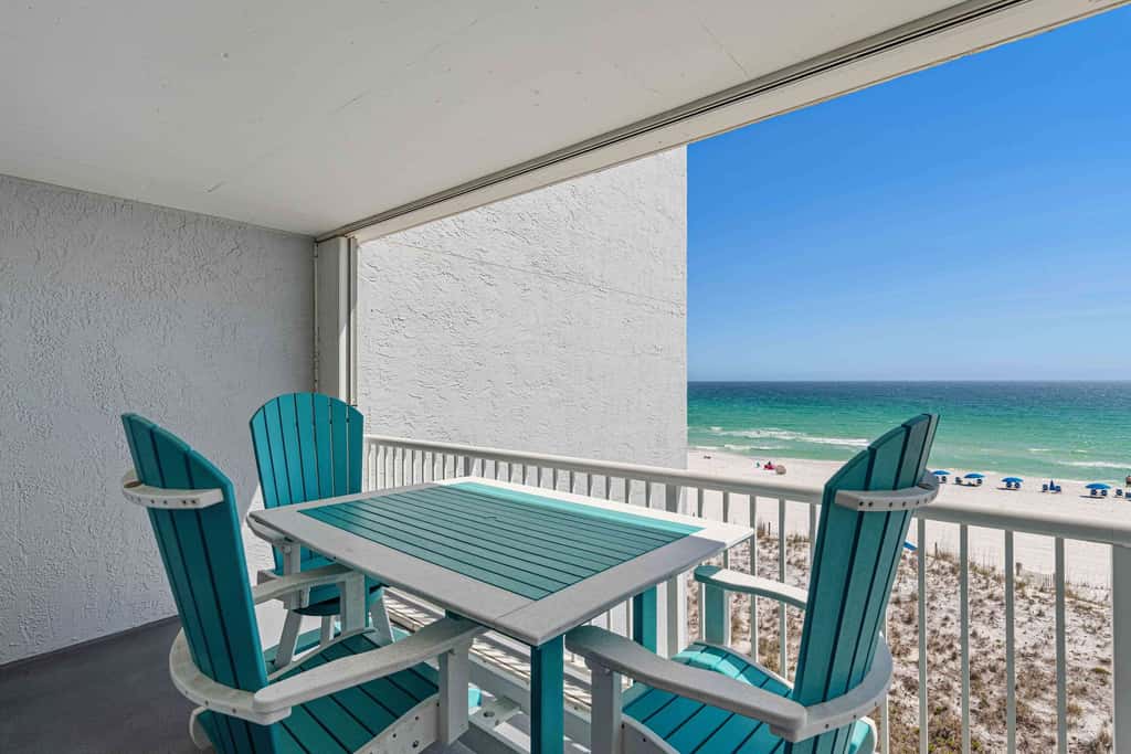 Beachfront condo with gulf views, pool, gym, & private balcony