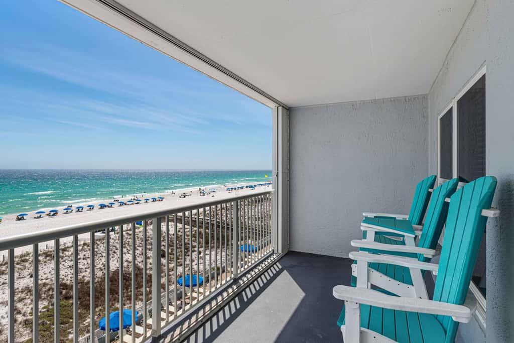 Beachfront condo with gulf views, pool, gym, & private balcony