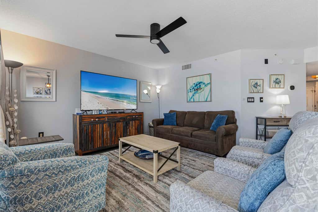 Beachfront condo with gulf views, pool, gym, & private balcony