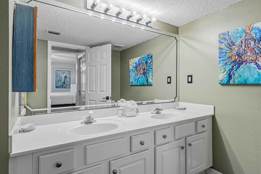 Beachfront condo with gulf views, pool, gym, & private balcony
