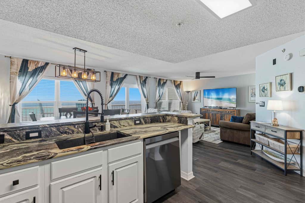 Beachfront condo with gulf views, pool, gym, & private balcony