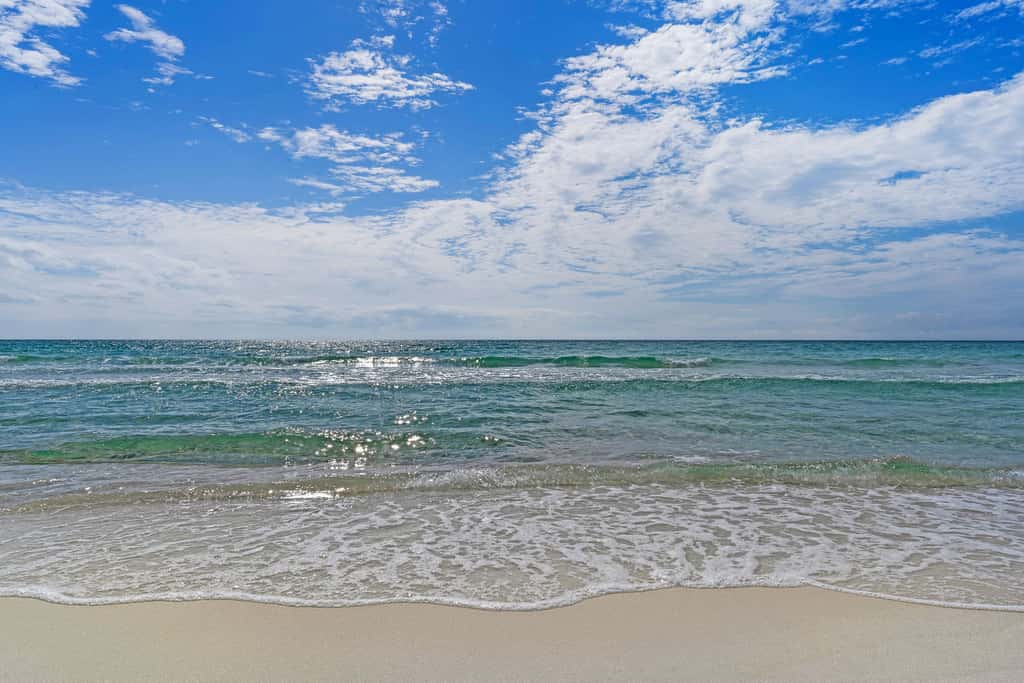 Beautifully decorated oceanfront condo with resort pool, & huge walk-in showers