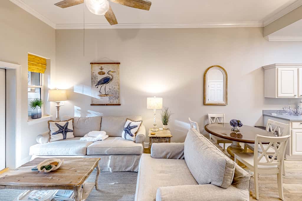 4th-floor condo near the beach with balcony, outdoor pool, elevator, laundry, & AC