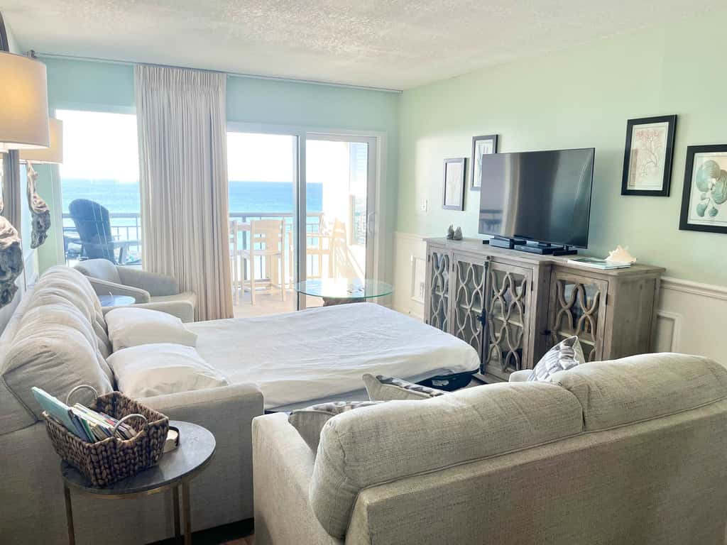 Updated beachfront condo with beach setup & quick drive to entertainment